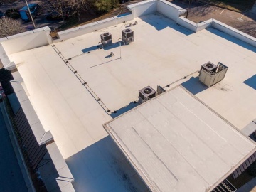 Why a Lot of Commercial Flat Roofs Are White Why a Lot of Commercial Flat Roofs Are White